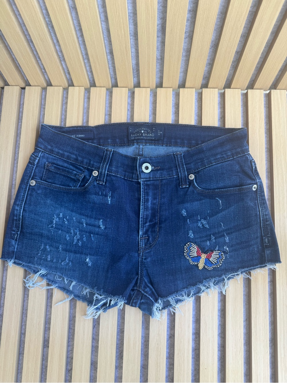 Lucky Brand Dark Blue Distressed Denim Shorts with Embroidered Patch